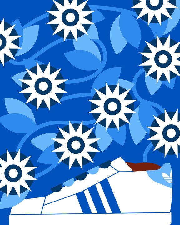 White Adidas sneaker under a blue pattern of leaves and starbursts